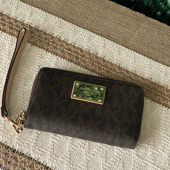 Michael Kors Handbags - Michael Kors Brown Monogram Compact Zippy Wristlet Wallet